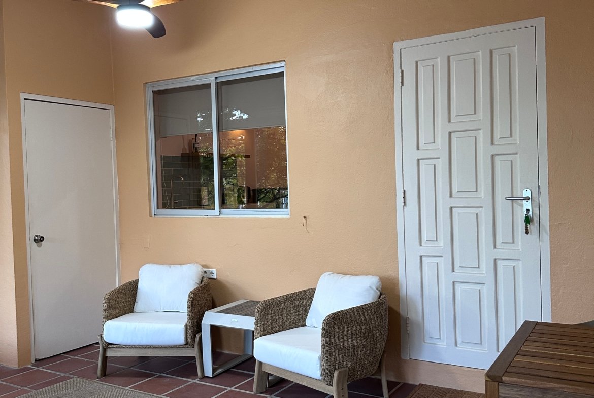 Terrace with seating area + dining table for two persons. Also small storage.